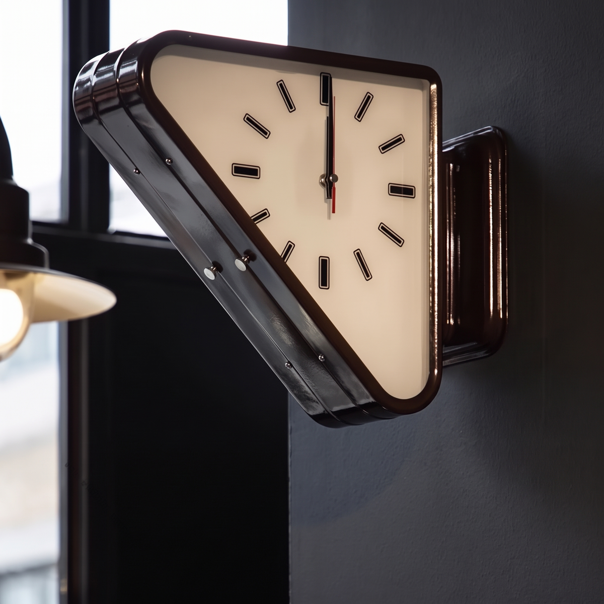 Nova Triangle Double-Sided Corner Wall Clock, dark wall corner mount, bronze trim, cream dial