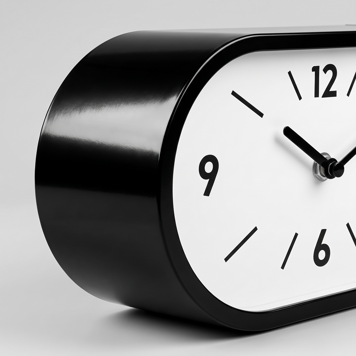 Kellan Black Curved Double-Sided Corner Wall Clock close up of casing and dial