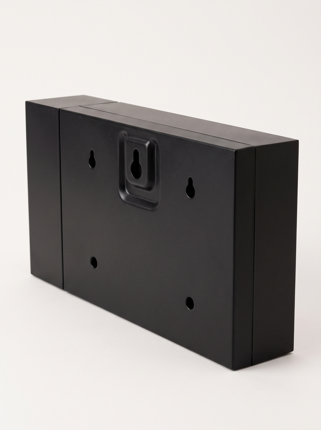 Back of Harlan clock showing the wall mounting bracket and screw holes
